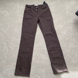 Brown bootcut with slit jeans